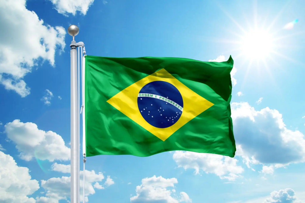 National,Brazil,Flag,Waving,In,The,Wind,,Against,The,Blue